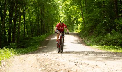 A cyclist on a dirt road