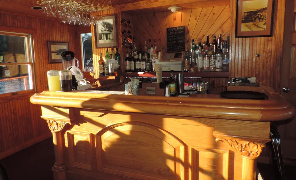 wood bar located on the boat