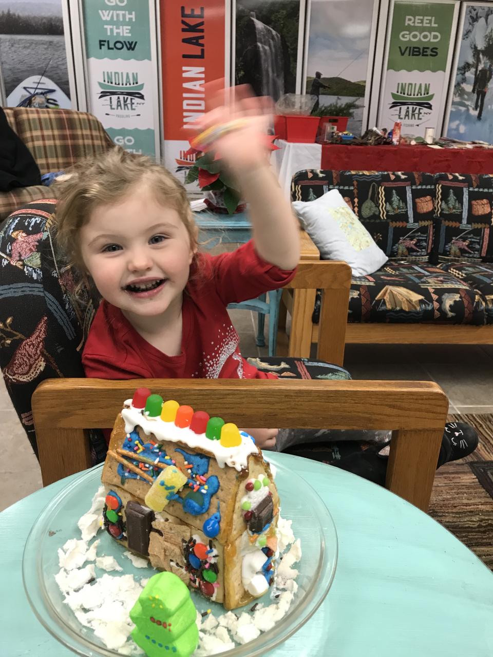 Child with gingerbread house