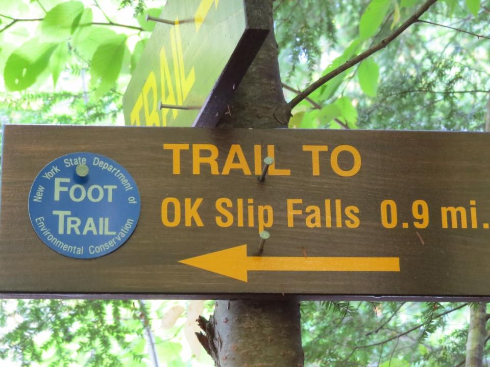 OK Slip Falls sign 2 miles in