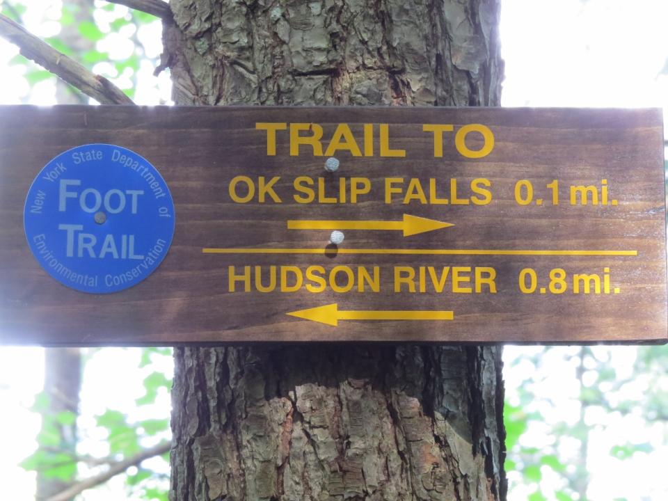 OK Slip Falls sign 3 miles in