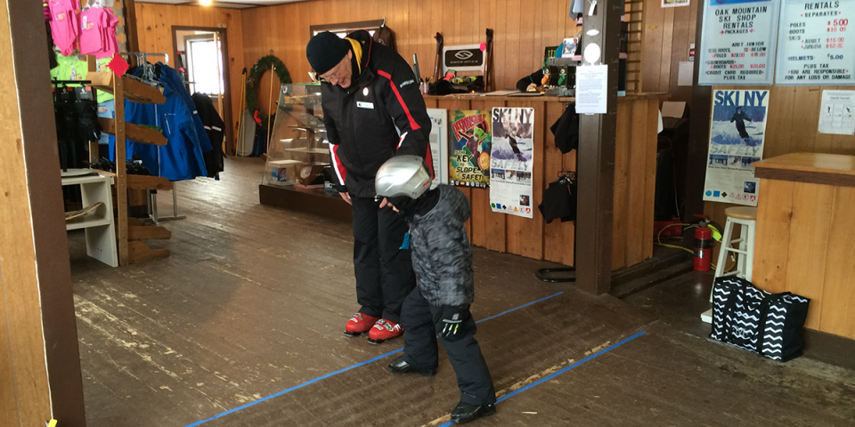Learning to walk in ski boots