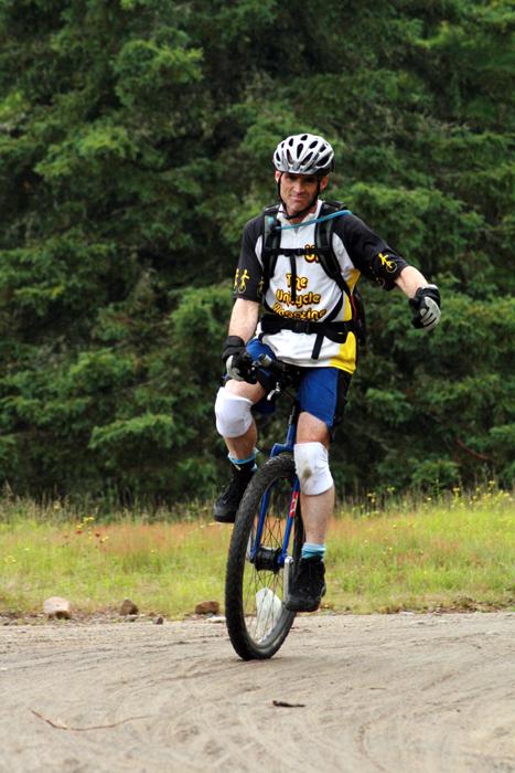Unicyclist Steve Relles compete in the 2010 Black Fly Challenge - Inner Mountain Photo