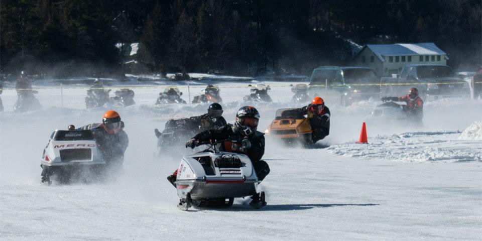 Vintage snowmobile races on Fourth Lake in Inlet