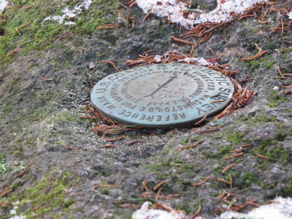 Metal marker on the summit of West Mountain