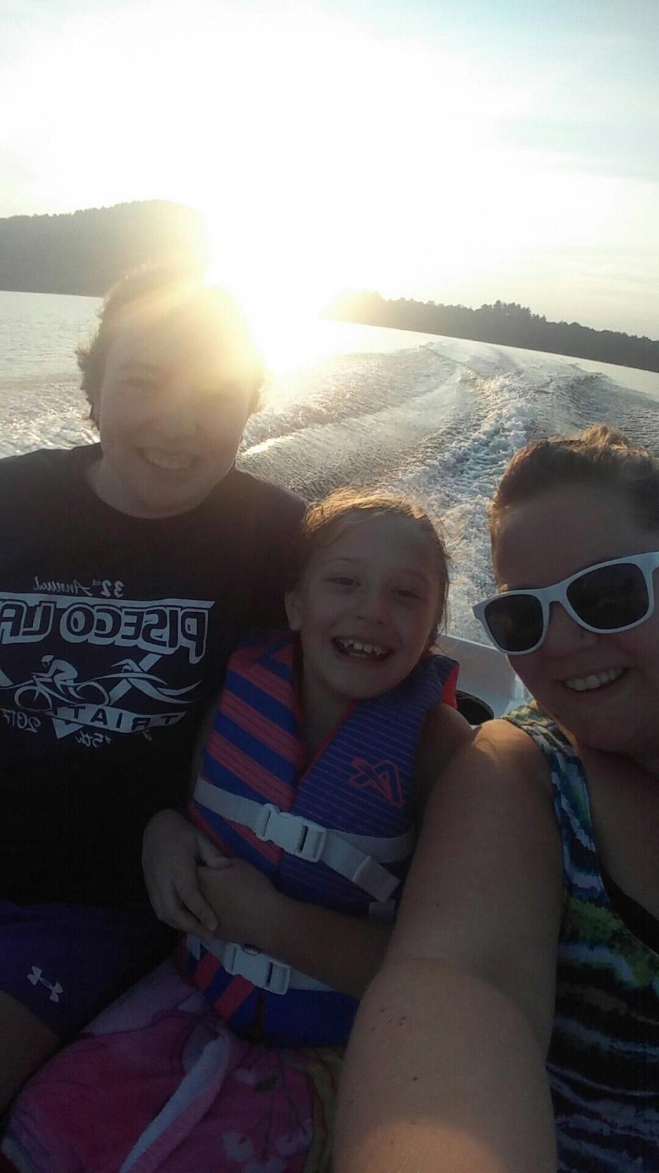 Zoey, Colleen, and RaChelle on Piseco Lake.