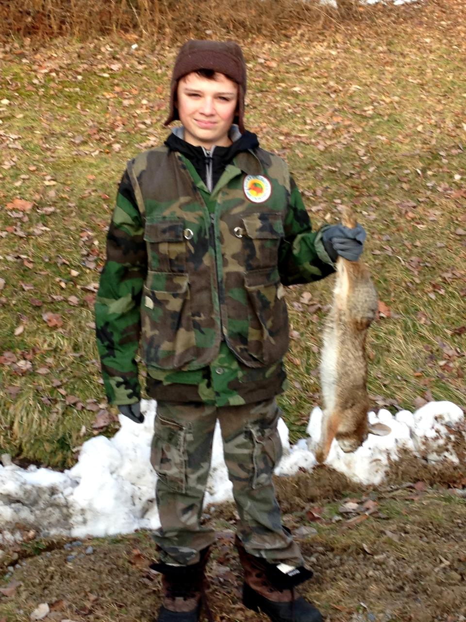 Holden with his first rabbit.
