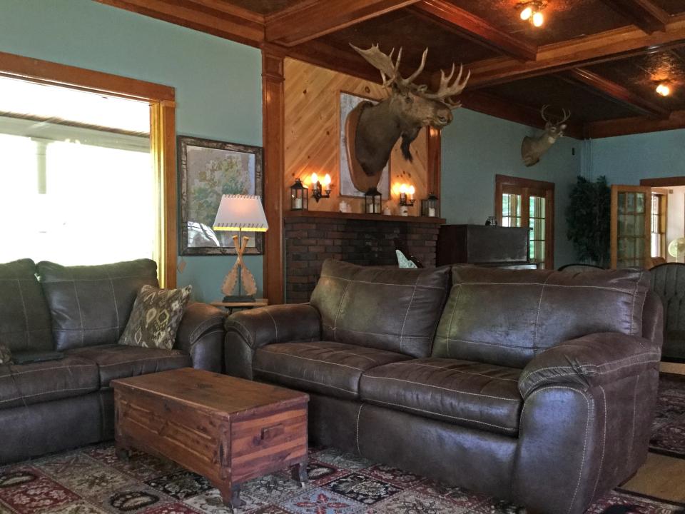 Relax in the Great Room with its giant couches and big fireplace.