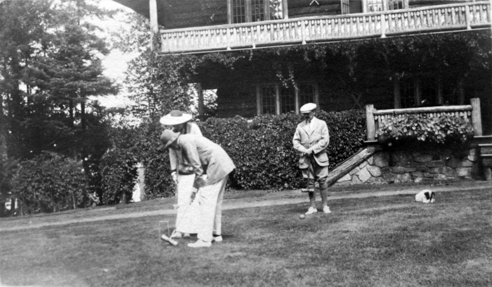 A game of croquet in the early 1900s. The dog is likely Alfred's dog, Stormy. Image courtesy Library of Congress.
