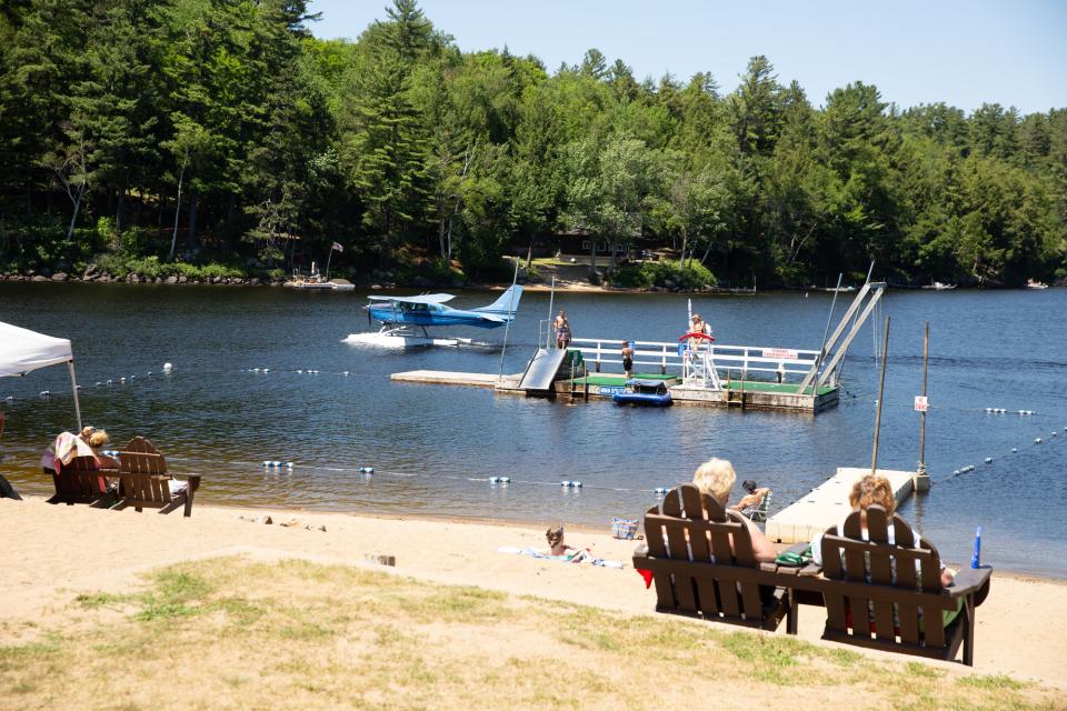 Swimmers enjoy the roped-off designated swim area at Long Lake