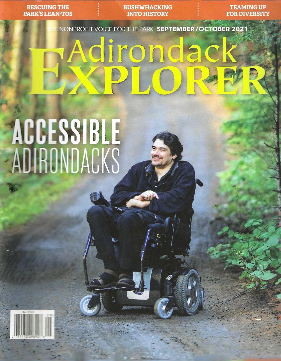 The cover of the magazine Adirondack Explorer, showing the author in his wheelchair.