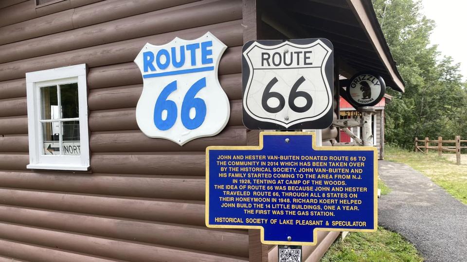 Route 66 signs mark the miniature village of "Route 66" located in the Speculator village park.
