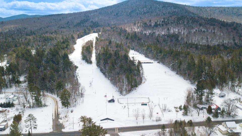 An aerial view of Mt. Sabattis and an ice skating rink.