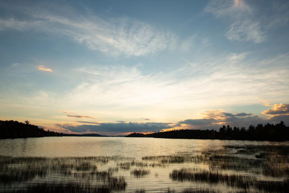 A sunset view of a lake