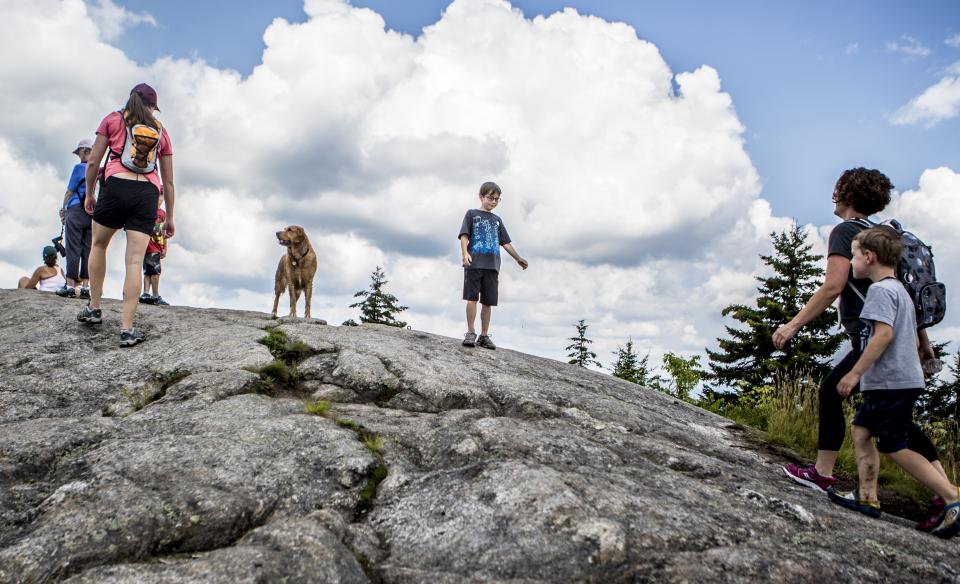 Meet new friends at Coney Mountain's rocky summit.