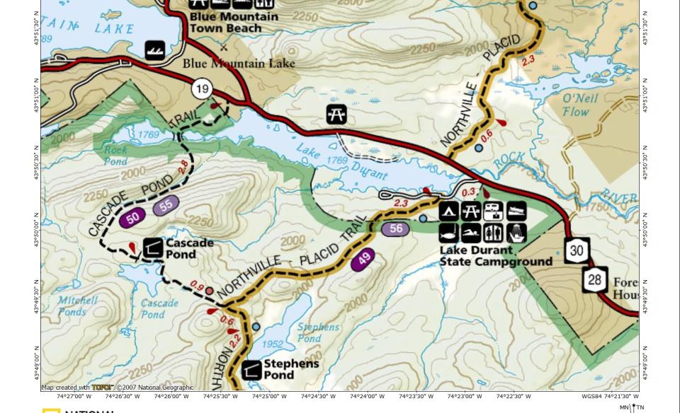 A map showing trails, bodies of water, and roads.