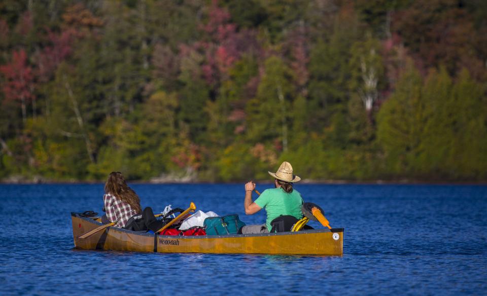 Two people canoeing on Eighth Lake